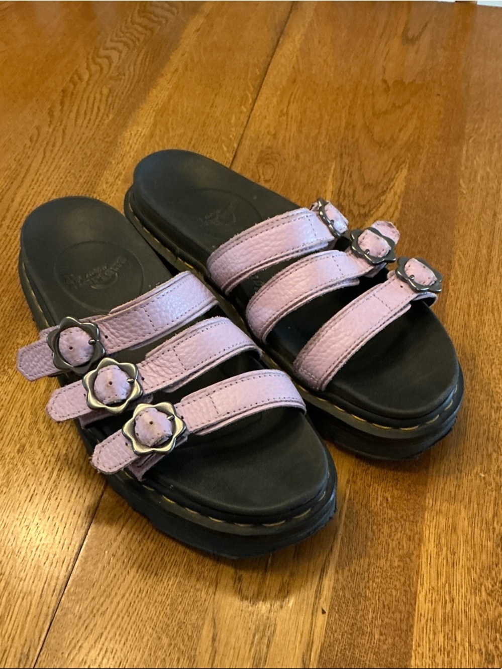 Woman’s Dr. Martens lavender strap sandals. Size 11 or 12. Heel to toe=11.5”.